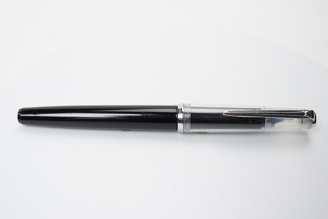 A rare Montblanc high top fountain pen in brown and black marble barrel with black cap